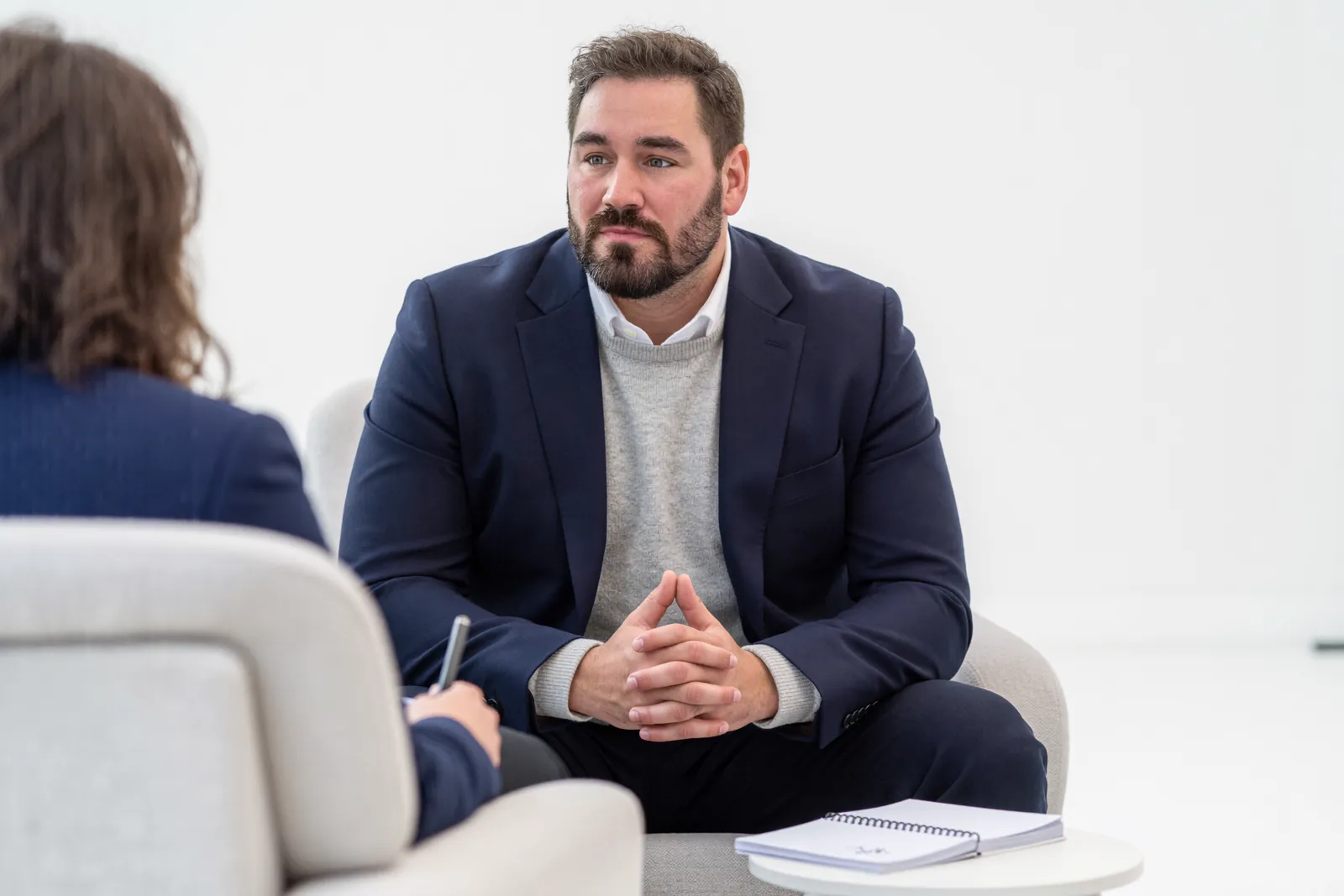 Ivo Schönberner listens to a managing director in a quiet one-to-one conversation